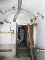 Ligne Maginot - COL DE GARDE (G) - EO10 - (Abri actif) - Bloc 4
Le magasin à munitions est utilisé comme chambre pour hommes et sous-officiers, voir les numéros des lits